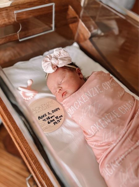 Baby girl receiving blanket and swaddle in soft pink with matching newborn bow headband. Had this exact wood coin with birth statistics for both of my daughters and love how their announcement photos came out!

#LTKbump #LTKfamily #LTKbaby