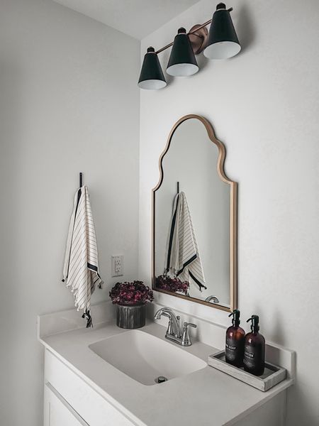 Love our new bathroom vanity light and it’s currently on sale. Run 🏃 

Industrial modern vanity light / bathroom mirror / organic modern / brass mirror / wall sconce / modern traditional / black and brass vanity light /

#LTKstyletip #LTKsalealert #LTKhome