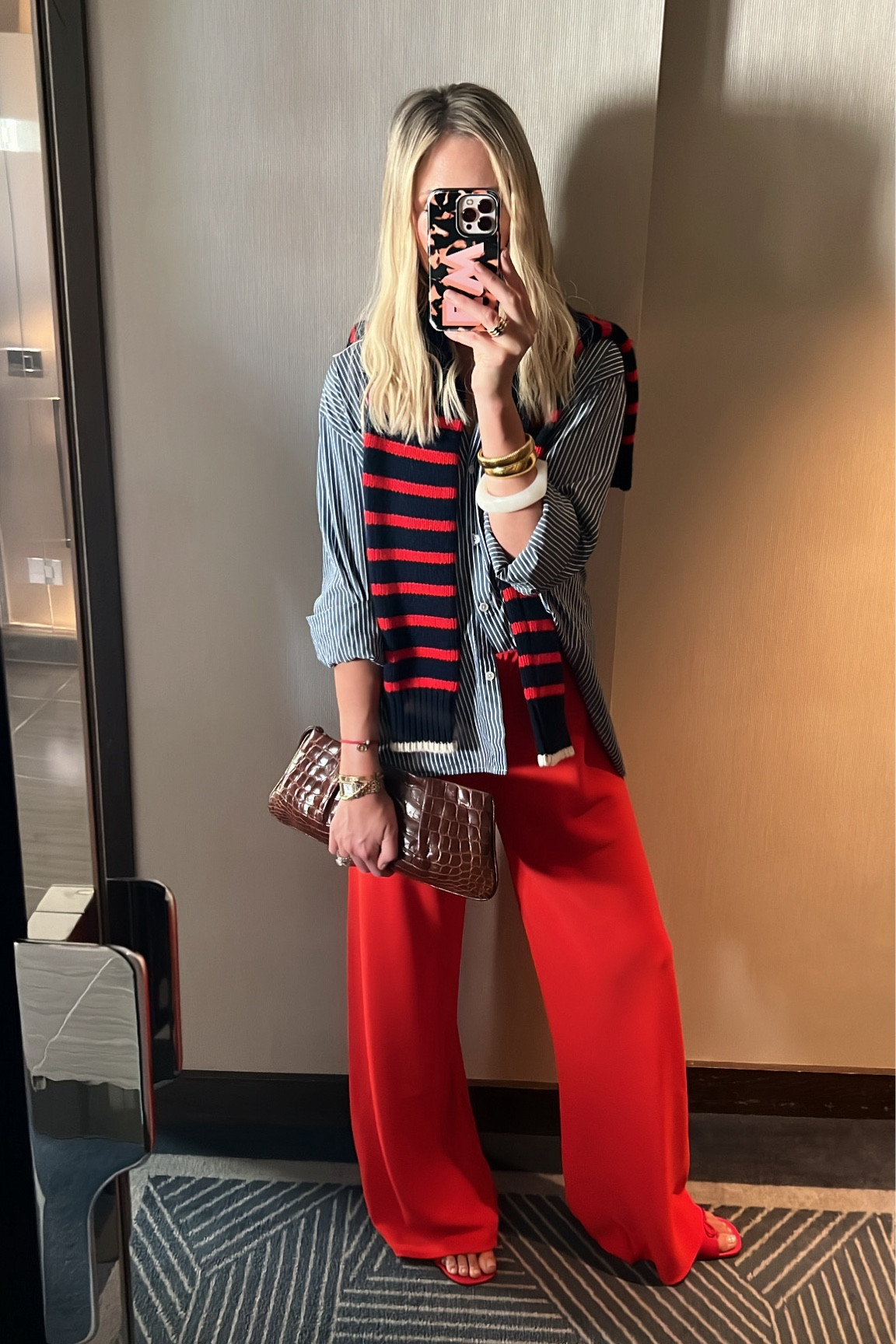 The cutest red pants. These are a lightweight crepe material and can be worn year round. We also love a blue and white button down around here and this one is the ultimate. Get your normal size in both. 

#LTKStyleTip