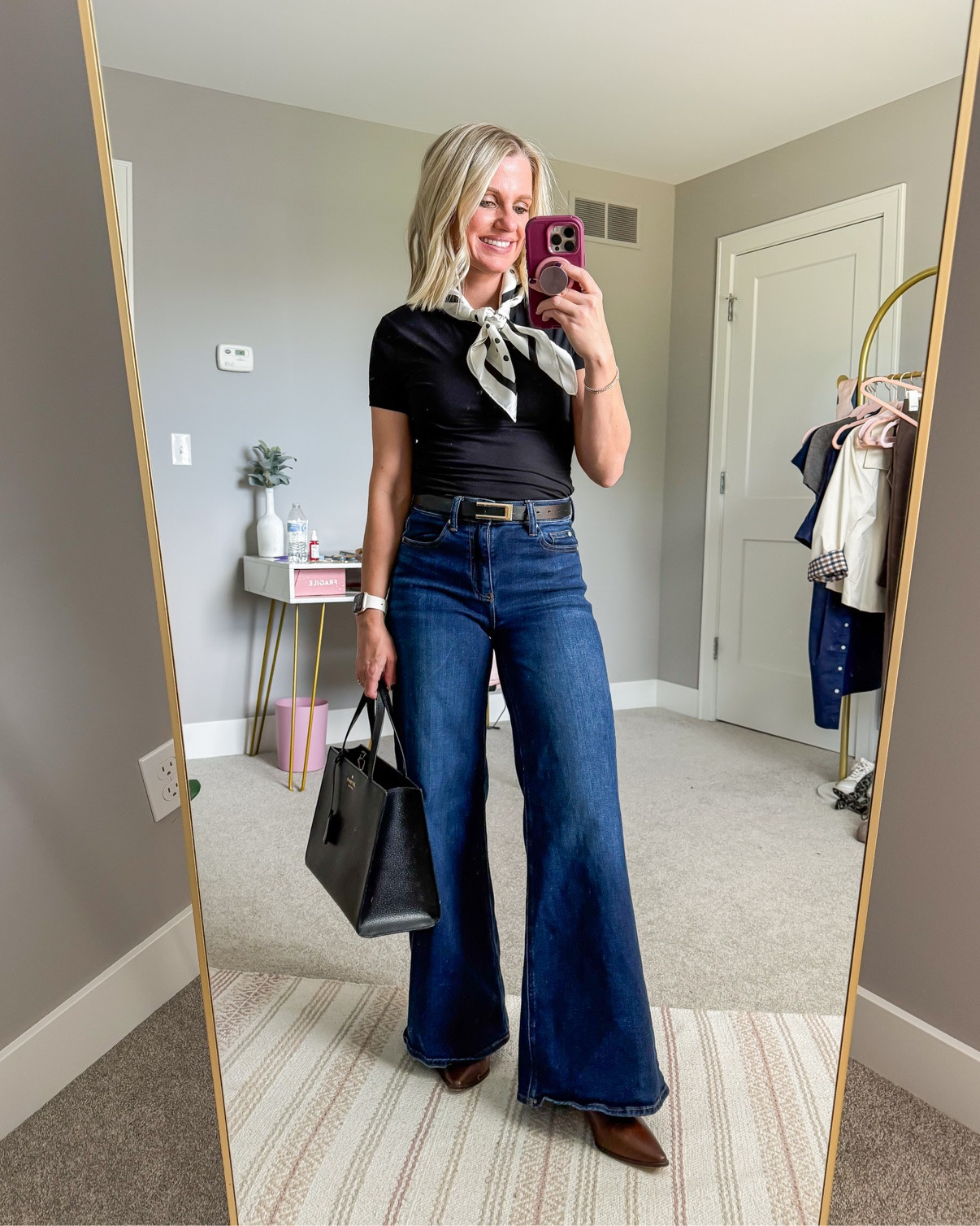 Wide-leg jeans with a black t-shirt and accessorized with a scarf! 
Top- small
Jeans- 25