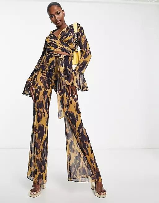 ASOS DESIGN wrap front jumpsuit with fluted sleeve in leopard print | ASOS (Global)