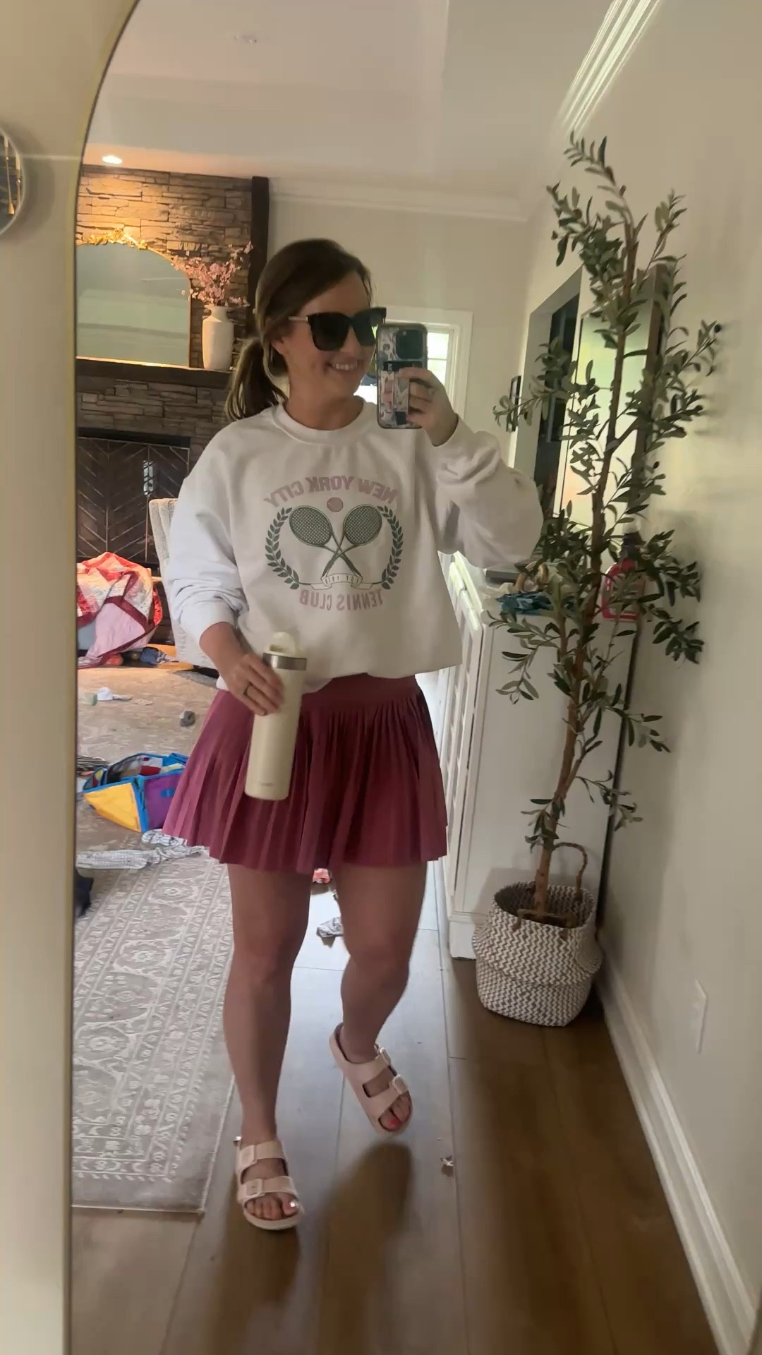 Casual sports mom outfit for the win! Love this pleated active skirt with built in biker shorts underneath. Paired it with slides, my fave tennis sweatshirt and sunglasses!! 

#LTKmomlife #LTKootd #LTKMothersDay