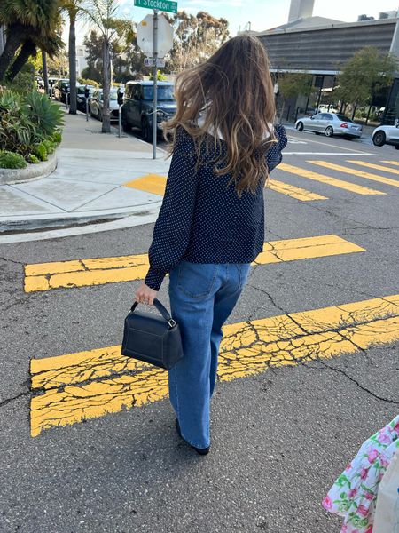 French girl aesthetic, French girl style, cool girl aesthetic, cool girl style, street style, navy bag, baggy jeans, Sofia Richie style 

#LTKworkwear #LTKover40 #LTKitbag
