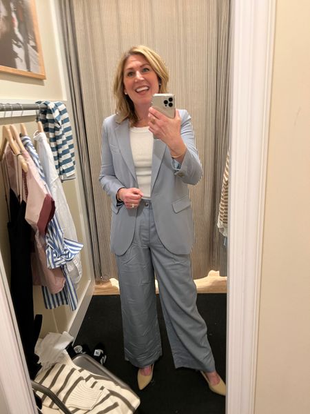 Grey blue single button blazer. Runs long. Fits tts. Trousers run tts. Button and zip closure. Elastic in back waistband. Tank is fitted. Size up for a roomy fit. 

#LTKSale #LTKworkwear #LTKstyletip