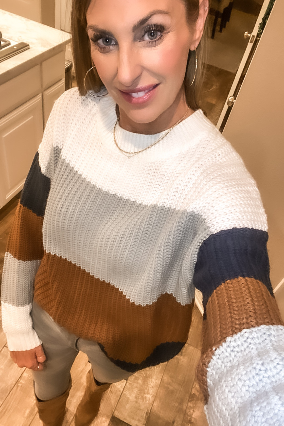 Color block sweater size small - free ship w prime
Boots run 1/2 size big 
Best lip shine & volumizing mascara 

#LTKstyletip #LTKshoecrush #LTKunder50