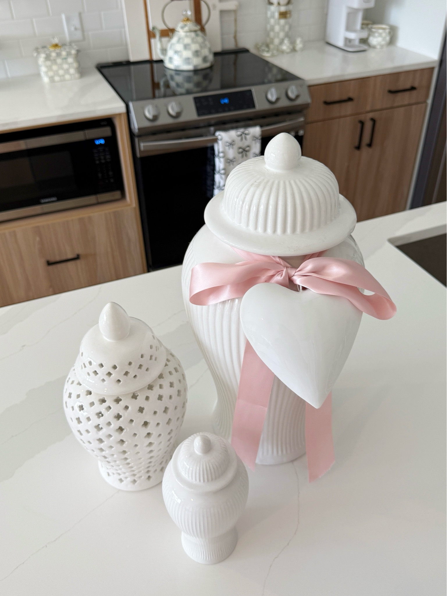 Easy little island refresh! Three ginger jars with a ribbon tied around the lid!🎀 Love adding this heart for some Valentine decor! 

#LTKSeasonal #LTKGiftGuide #LTKActive