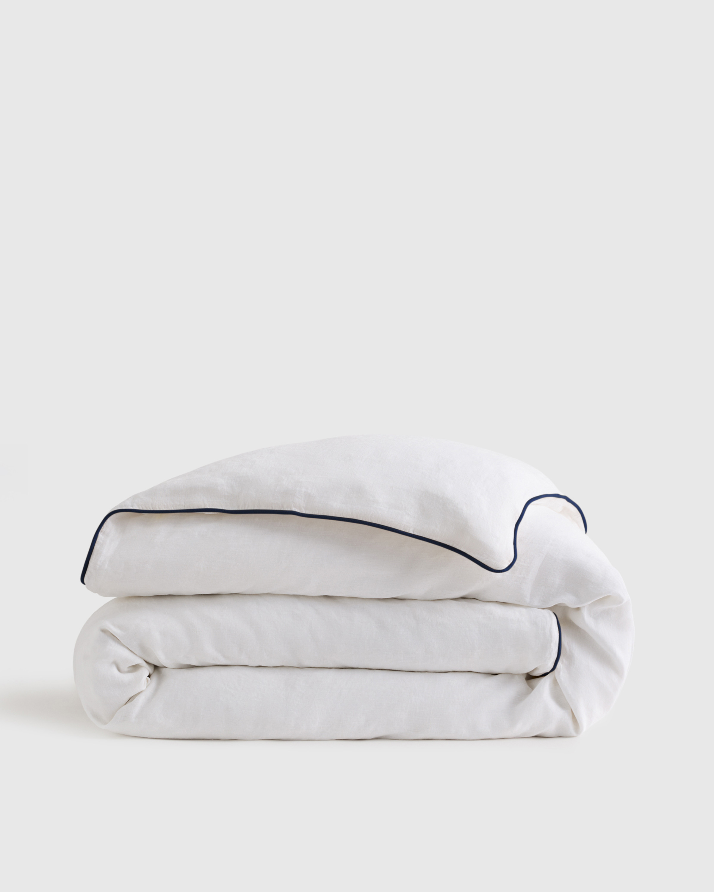 Quince | European Linen Piped Duvet Cover in White/Navy, Size Full/Queen | Quince