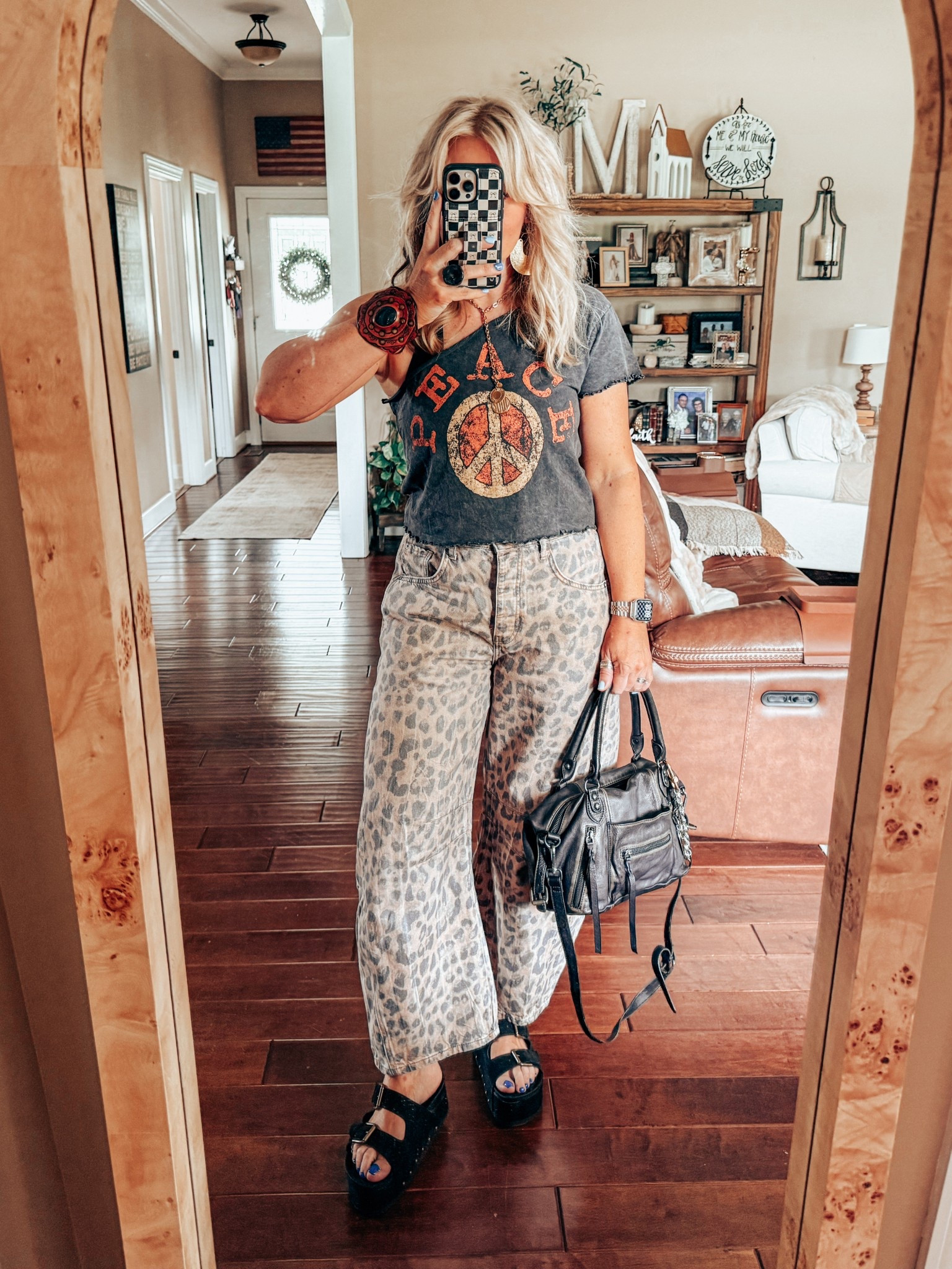 Decided to cut this tee into a one shoulder and I love it! My tee is a medium. My jeans I’m in my true size and they come in more prints. 
I’m wearing my true size in these black sandals. 
👚T-shirt is @threebirdnest save with code MANDIE20MAULDIN 🔗 to shop is 👇🏼https://collabs.shop/vnaj3o
✨Necklace is @twistedsilver save with code MANDIE50 


#LTKOver40 #LTKShoeCrush #LTKStyleTip