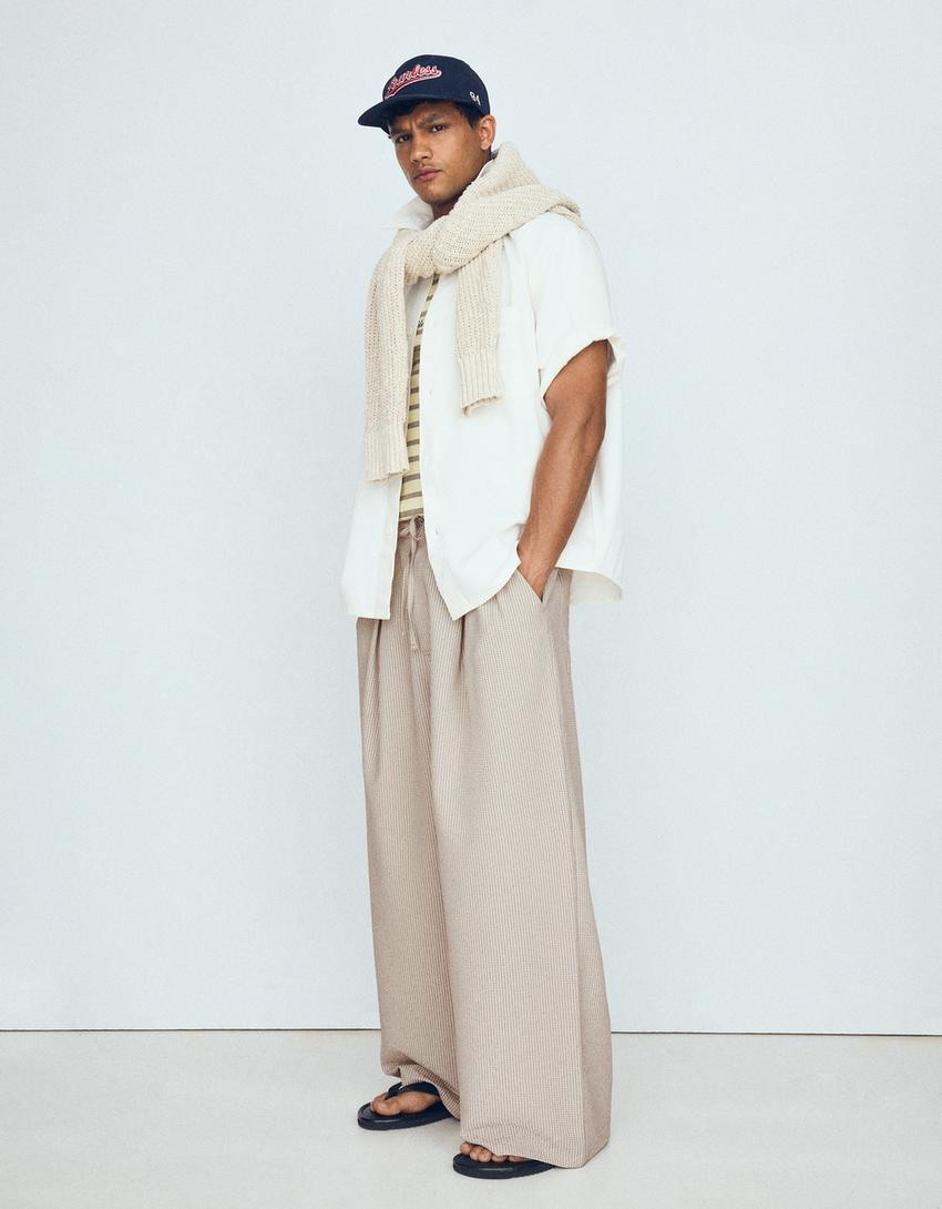 Mega baggy checked trousers - Women | Bershka UK