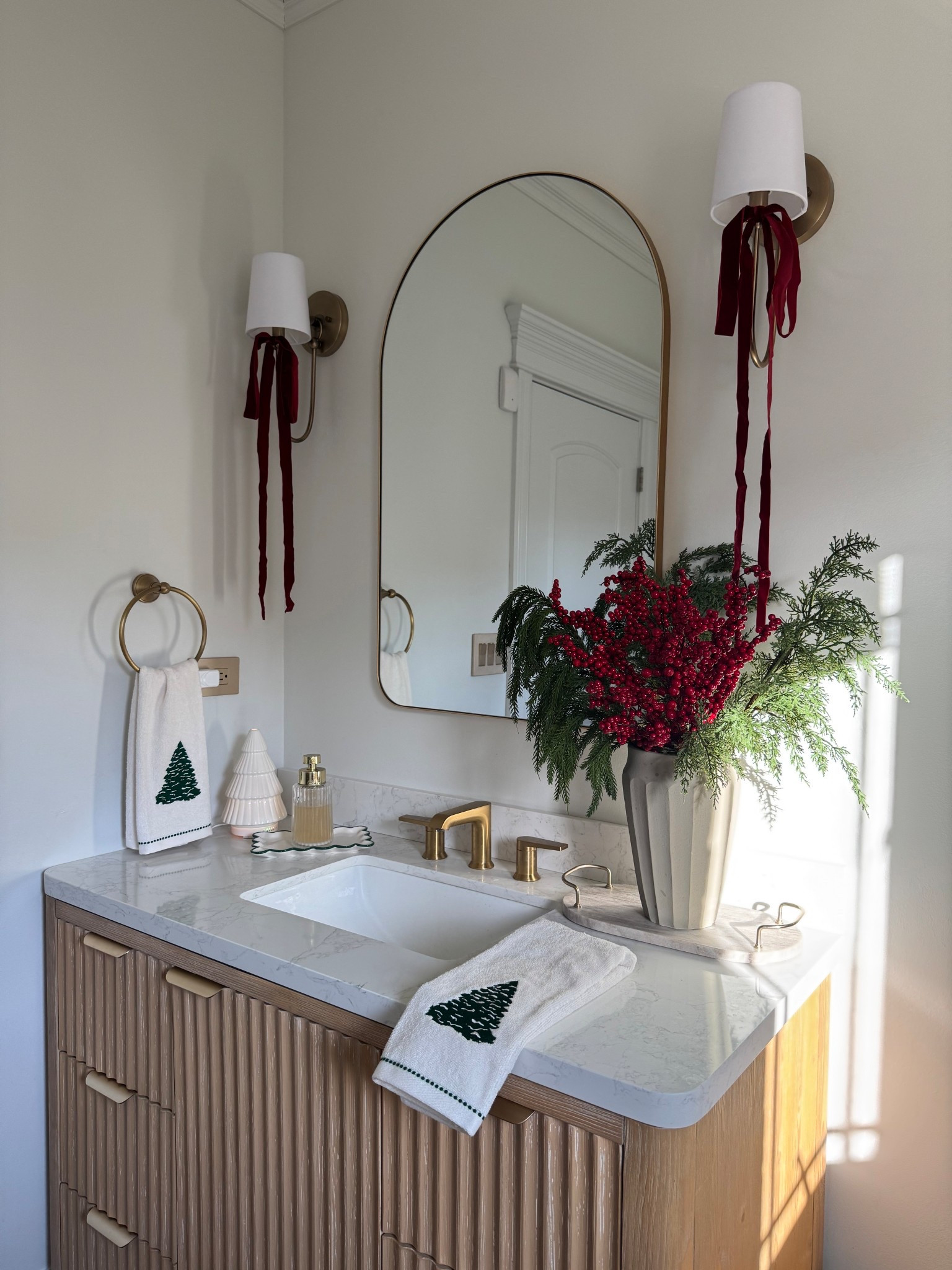 Our powder bathroom decorated for the Holidays! Mirror, sconces and vanity are all on sale now too! 

@wayfair #wayfairfinds #powderroom #bathroom #holidayhome #holidaydecor #christmasdecor #christmas #targetstyle #wayfairhome #vanity #mirror #sconces #christmas 

#LTKHome #LTKHoliday #LTKSeasonal