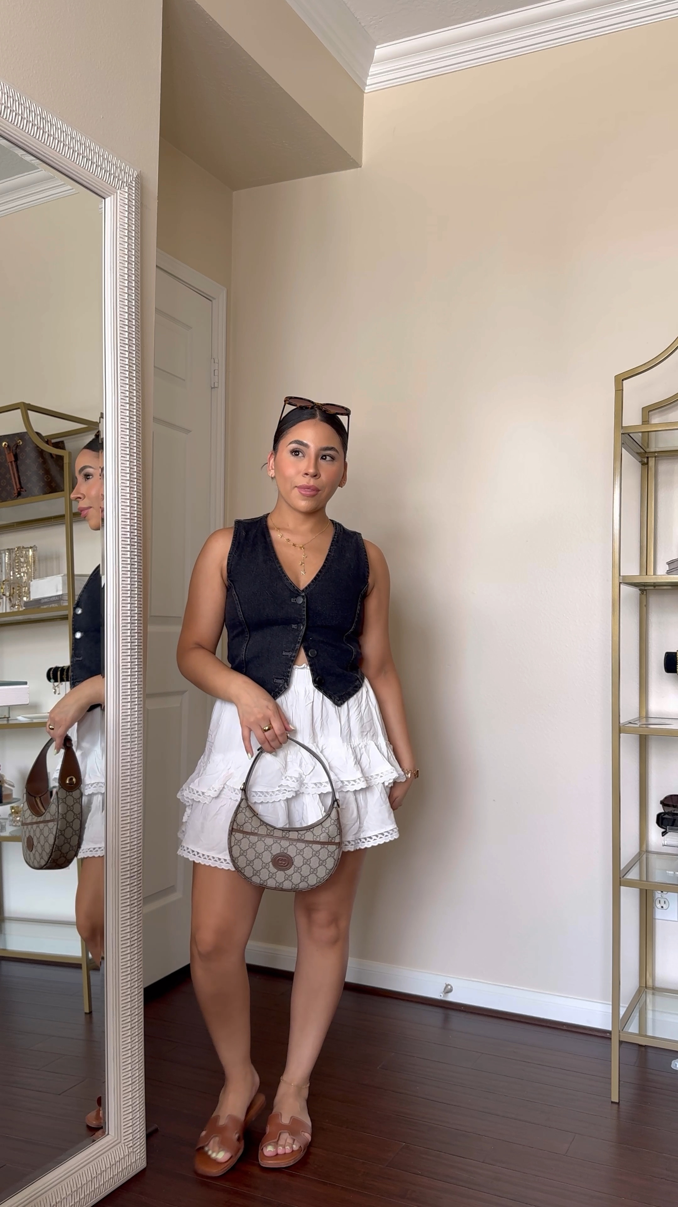 Summer outfit idea 
Denim vest: small 
White ruffle skirt: small 
Gucci half moon bag 
Brown sandals: 7 
Tortoise sunglasses 

#LTKFindsUnder100 #LTKSaleAlert #LTKStyleTip