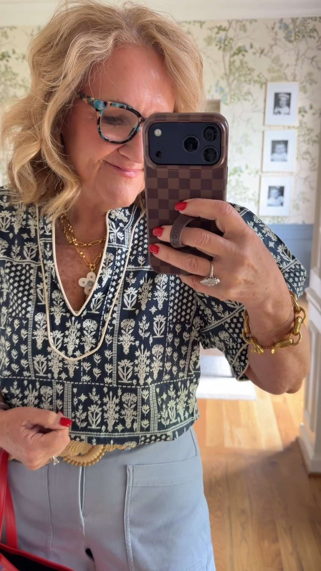 I love the beautiful blue-and-cream print, the pretty neckline details, and those statement sleeves. It has that elevated boutique feel while still being easy and comfortable to wear. 🫶🏻 

 #LTKootd #LTKSeasonal #LTKOver40