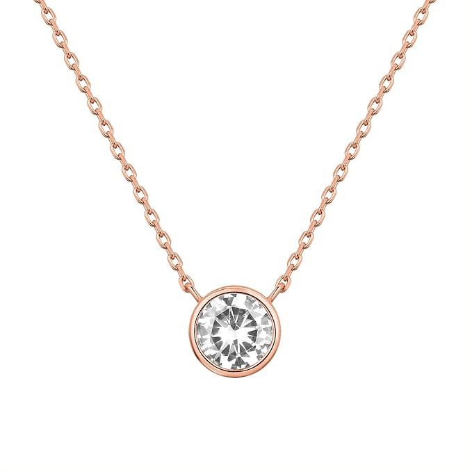 PAVOI 14K Gold Plated 1.00 ct (D Color, VVS Clarity) CZ Simulated Diamond Bezel-Set Solitaire Cho... | Amazon (US)