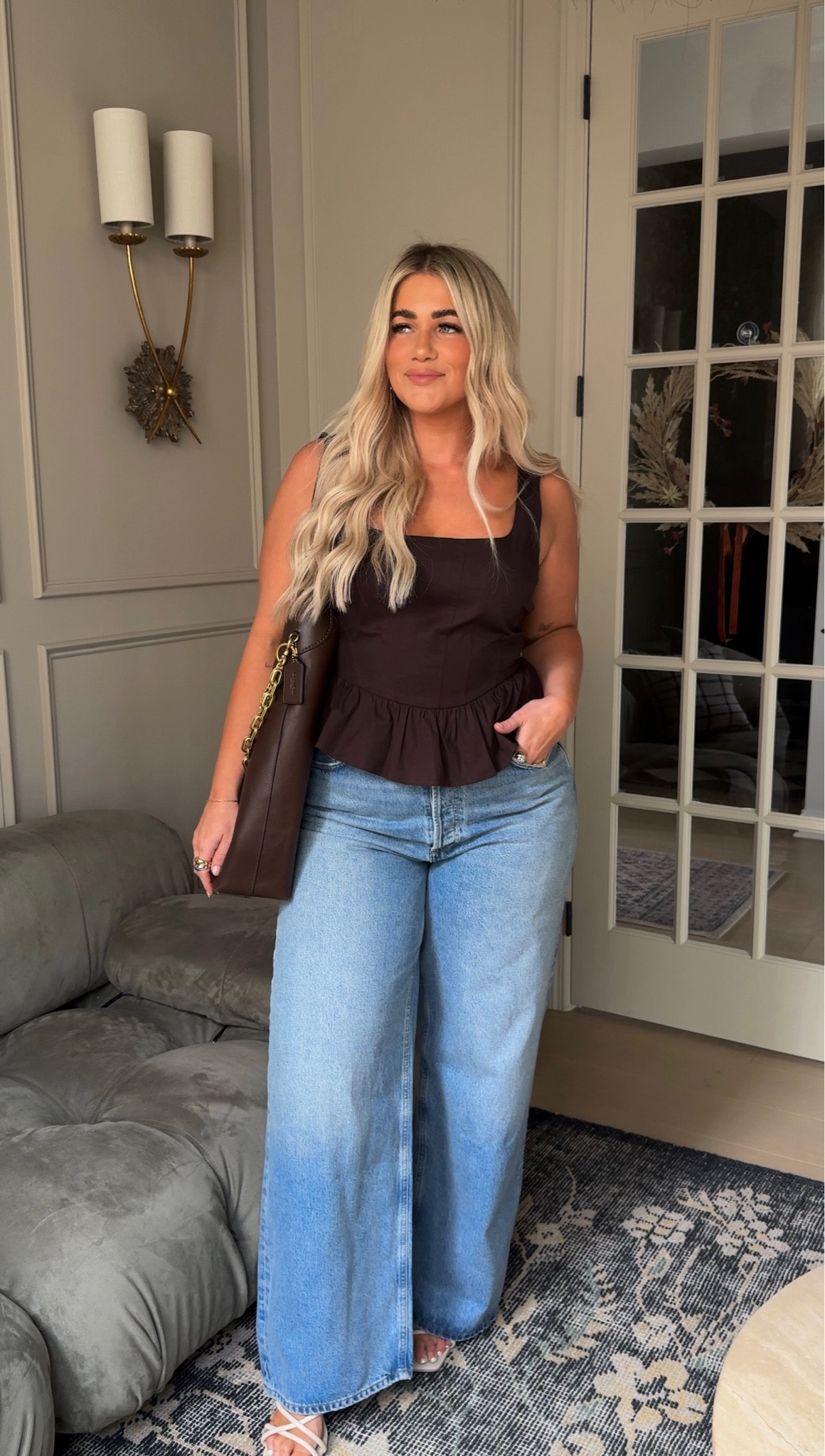 Cutie outfit for warmer weather but want to look fall🤎👜 #fall #ootd #brown 

Top- large 
Jeans-31 

#LTKFallSale #LTKStyleTip #LTKMidsize