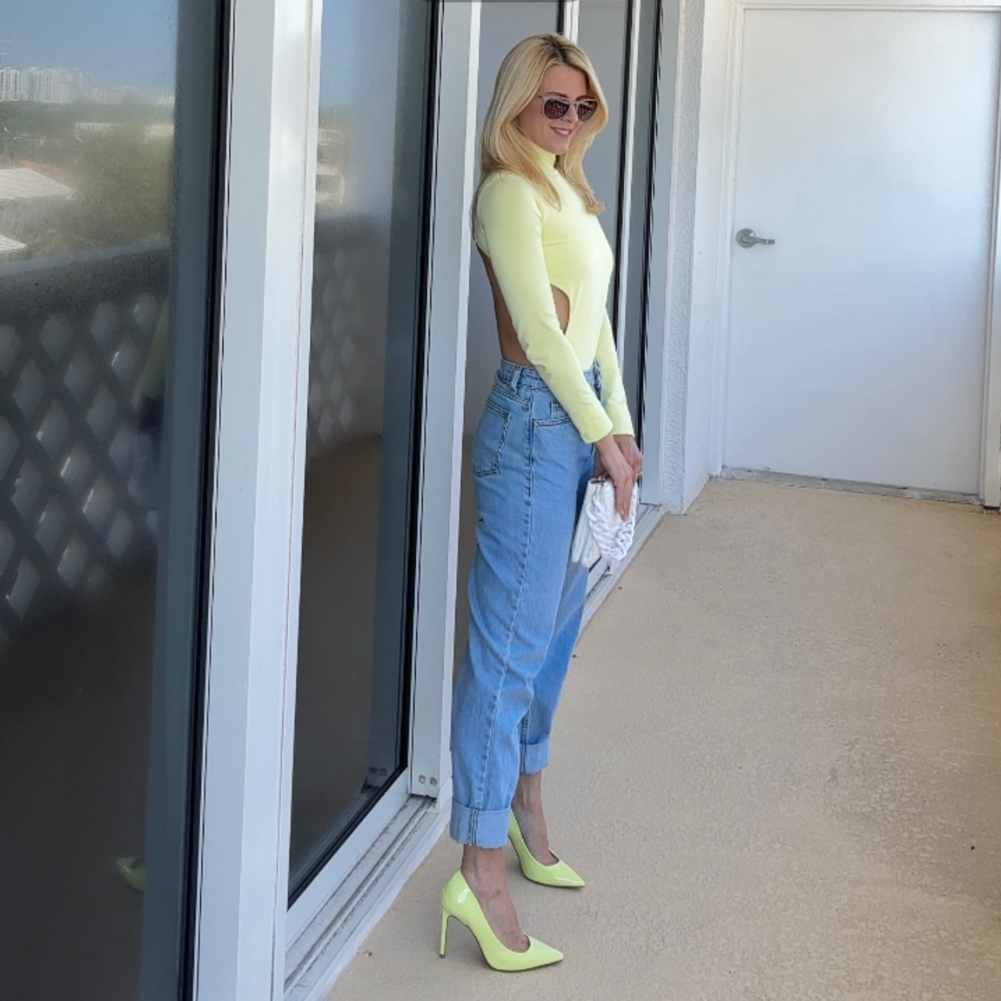 This bodysuit is true to size

The jeans are no longer available,  I linked similar high waisted mom jeans.  

The heels I ordered my usual size in pumps.   7.5.   (I am a 7 but size up in a pump)
