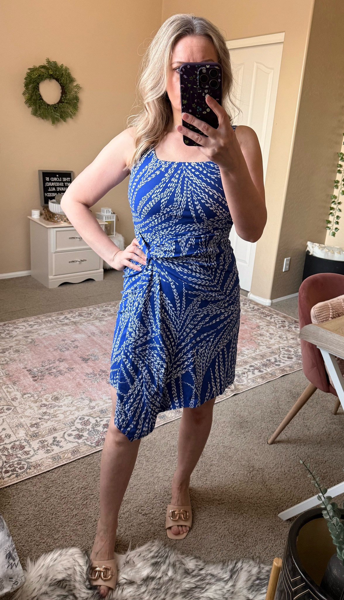 This cute dress is perfect for summer vacations. It’s made from a soft cotton blend knit and has a wrap-inspired mini style with a twist for an extra flattering finish. It’s from Loft and is currently on sale.

#LTKPetite #LTKSeasonal #LTKOver40 #LTKSaleAlert