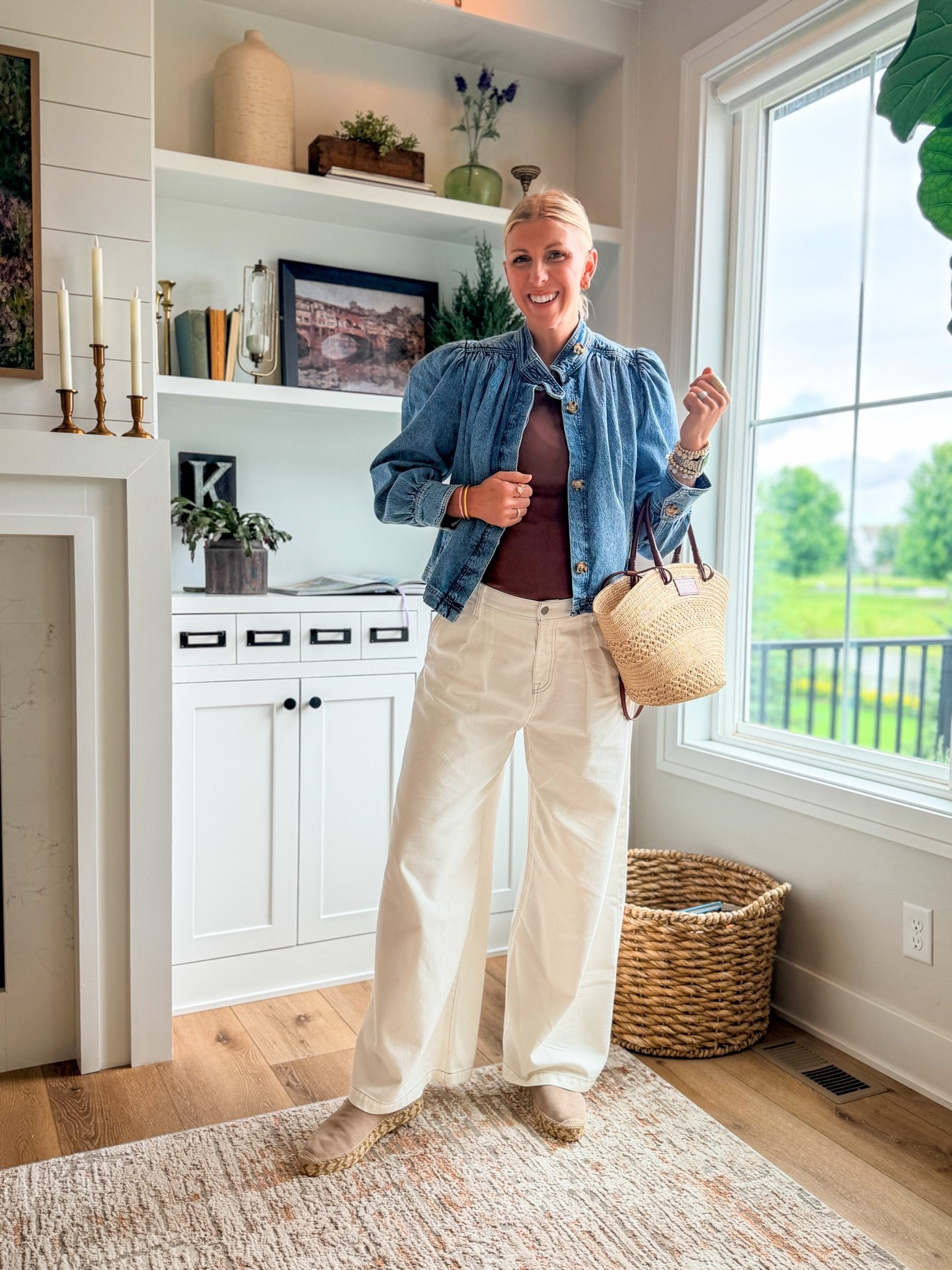 Wide-leg denim, but make it summer. 🤎

If you’ve been unsure whether you can pull off wide-leg jeans, this is your sign to try the right formula before writing them off.

These are a really flattering mid-rise wide-leg jean in 100% cotton, but they’re surprisingly lightweight — which makes them feel much easier for summer than a heavier denim.

They fit true to size, but for reference, I’m 5’10” and 23 weeks pregnant, so I sized up to a 30 to fit my growing bump.

The styling key is proportion:

A mid-rise keeps the waist comfortable and flattering.
A fitted tank balances the volume of the wider leg.
And a lightweight denim jacket that hits right at the hip adds shape without adding bulk through the midsection.

Shop the full look here.

#LTKootd #LTKSeasonal #LTKOver40