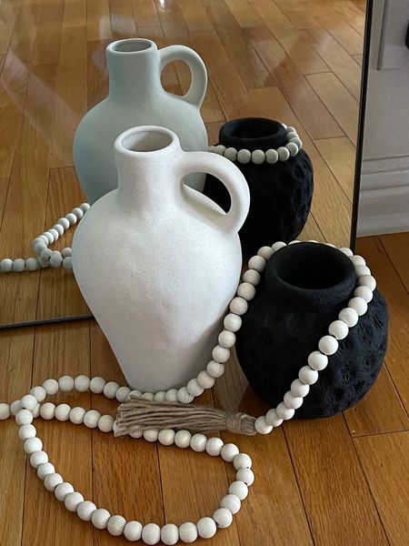 White vase has sand textured coating and is around 10in high. So beautiful 🤍
Black small vase is 6 in high and sourced from Bali. Terracotta material for dry flowers use.
Wood bead garland has jute tassels and is perfect for neutral home decor.

Find me on IG to see how I style them 🤍

Modern decor sustainable decor small business home decor black and white decor


#LTKFind #LTKhome #LTKunder50