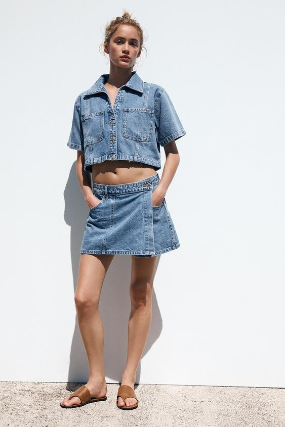 High-waisted skort with front pockets and back patch pockets. Front wrap closure with hidden zipp... | Zara US