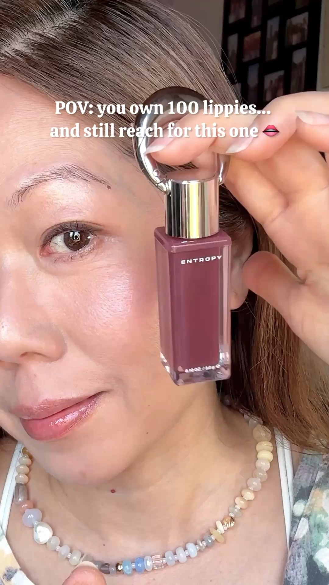 This is the ENTROPY Makeup Glossy Lip Tint in Beryl — a cool-toned brown that somehow works so well on my warm skin 😮‍💨

The texture feels like a gel gloss — juicy, plump, but not sticky at all. It wraps around the lips like a moisturizing layer and gives that smooth, glossy finish without feeling heavy.

Sheer at first, but you can build it up for more depth without patchiness. And yes… you can use it on cheeks too for that soft, glowy look ✨

But the cutest part?
It comes with a clip-on keychain — I just hook it on my bag like a charm. No digging, no excuses. Reapply anytime 💁🏻‍♀️

If you want a glossy, wearable brown that’s low effort but looks put together… this is it.

#lipgloss #brownlips #glossylips #entropy #entropyglossyliptint 
