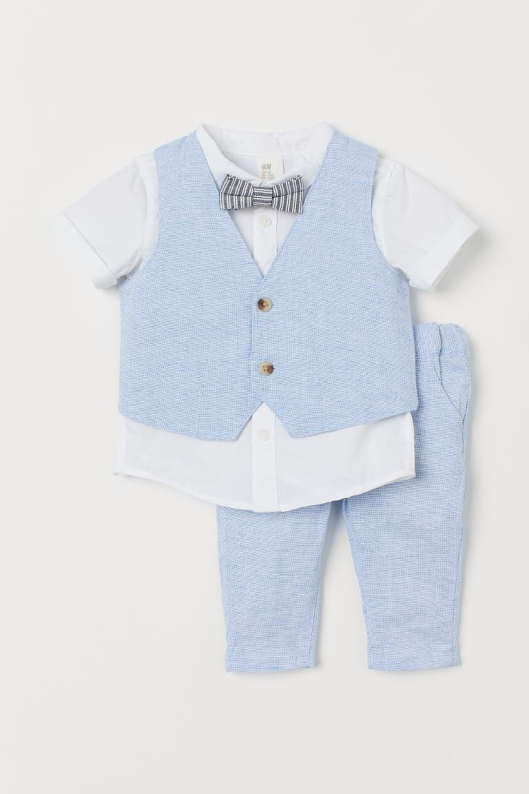 Set with a short-sleeved shirt in woven cotton fabric, vest, and pants in a woven linen and cotto... | H&M (US + CA)
