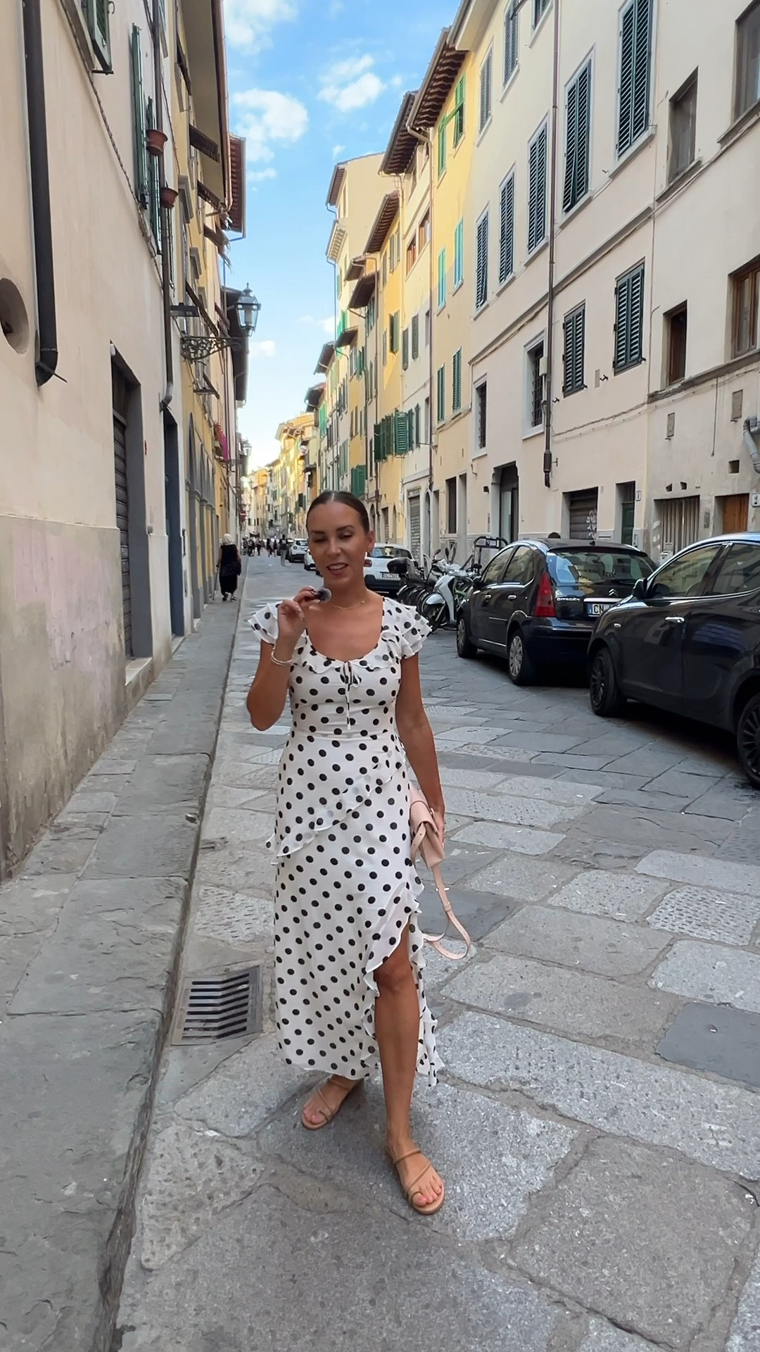 Breezy polka dot dress for a Michelin star dinner in Florence Italy. 
Polka dot. Wayf. Midi dress. Midi polka dot. White and black dress. Sandals. Travel outfit.

#LTKTravel #LTKFindsUnder50 #LTKSaleAlert