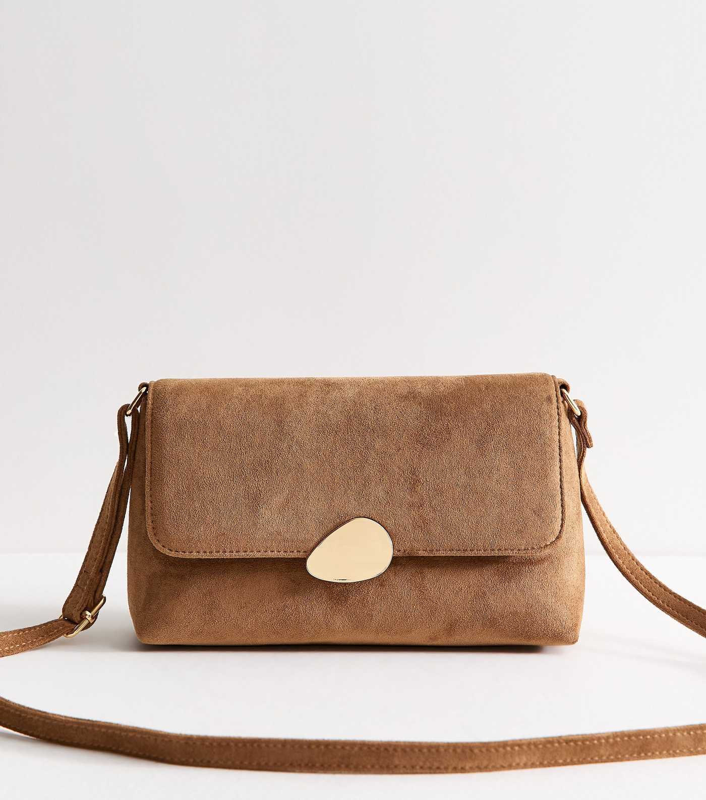 Tan Faux Suede Pebble Clasp Crossbody Bag | New Look | New Look (UK)