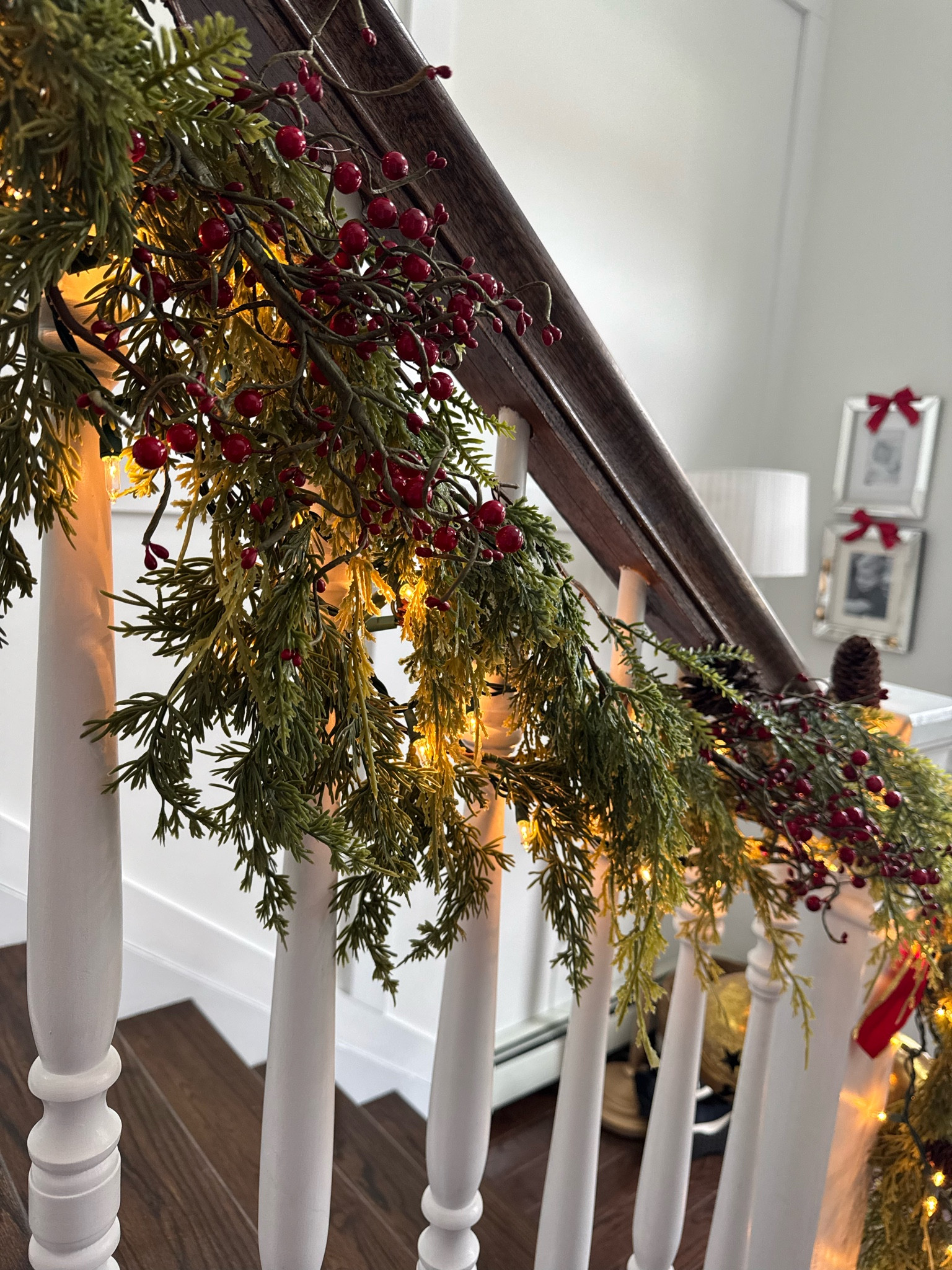 New holiday garland ♥️

I layered the cedar and pine garland on top of the hair cedar garland to make it fuller (for half the price). Then added lights and sprays of red berries (old but linked similar!) 

My staircase wraps around to the 2nd floor so to fully cover 6 of each are needed. 

#LTKHoliday