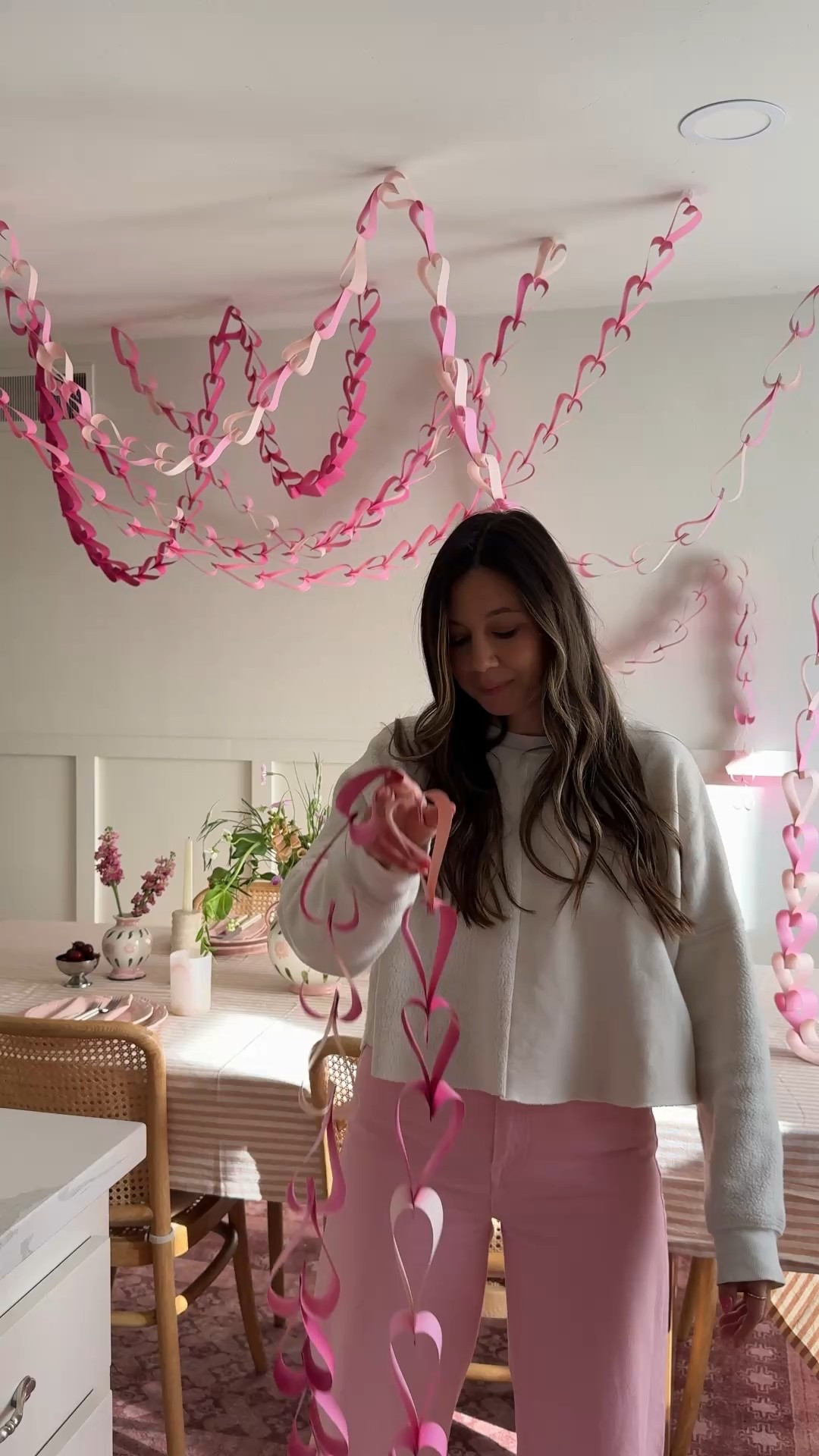 a pretty Galentines party set-up using heart paper chains 

#LTKValentine #LTKHome