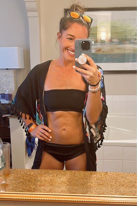 Bathing suit day #2. The best ever bandeau top that DOES NOT BUDGE while swimming and playing with kiddos but is also incredibly comfortable (no wires) - basically a 🦄   And the cover up is the best- I have in a few colors!

Top is a size 8, bottoms are a large ( a little big could have sized down to medium) 

#bathingsuit #bikinistyle #resortwear #beachstyle

#LTKswim