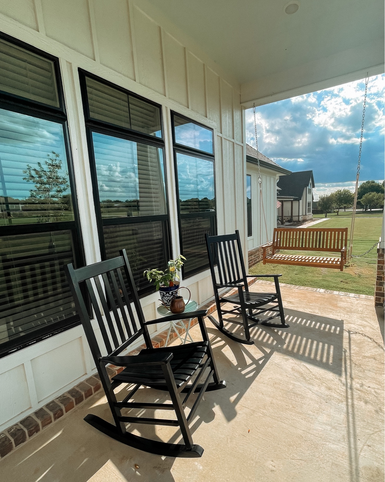 Front porch goodies! Rocking chairs set of 2! Wooden porch swing! Self watering spikes! Side table! Watering can! 

#LTKSeasonal #LTKunder100 #LTKGiftGuide