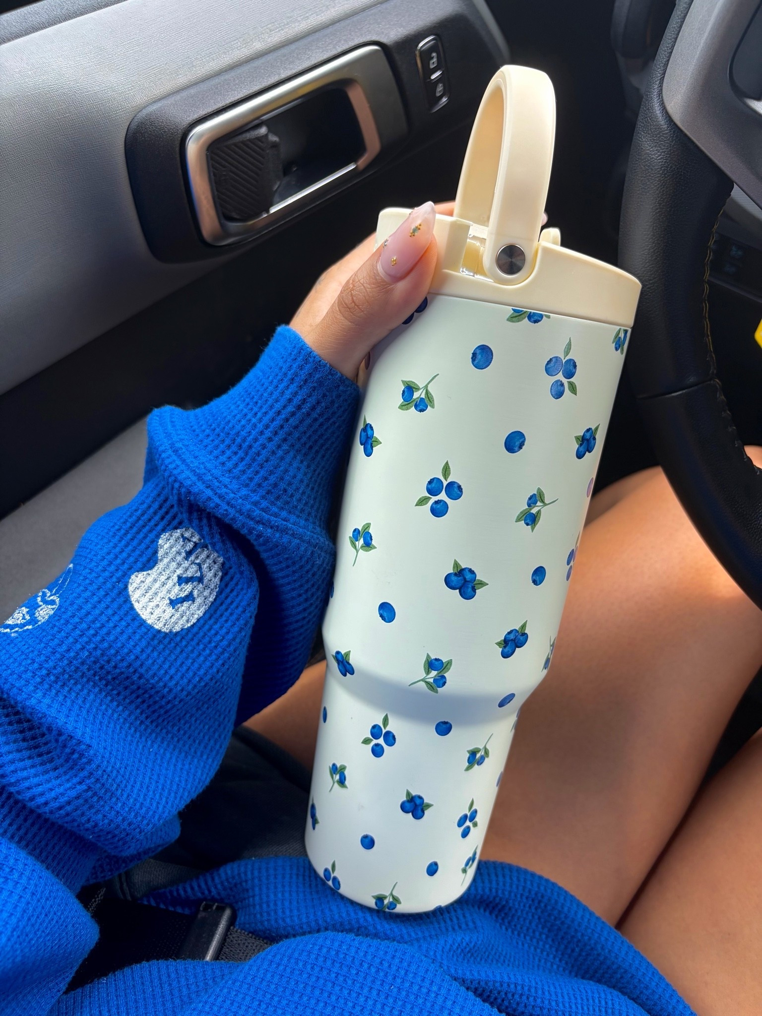 This weather has me dressing like it’s four seasons in one day 😭

Long sleeve thermal, shorts, and my new blueberry HydroJug that I’m fully obsessed with. The little blueberry print against the ivory?? So cute. I keep getting compliments on it everywhere I go and it accidentally matches half my wardrobe.

Trying to stay extra hydrated lately while working on inflammation and honestly having a cute water bottle helps more than I’d like to admit 😂💙
#HydroJug #WaterTok #CozyOutfit #ErrandOutfit #MomStyle #BlueberryAesthetic #CasualEverydayStyle #LTKFinds