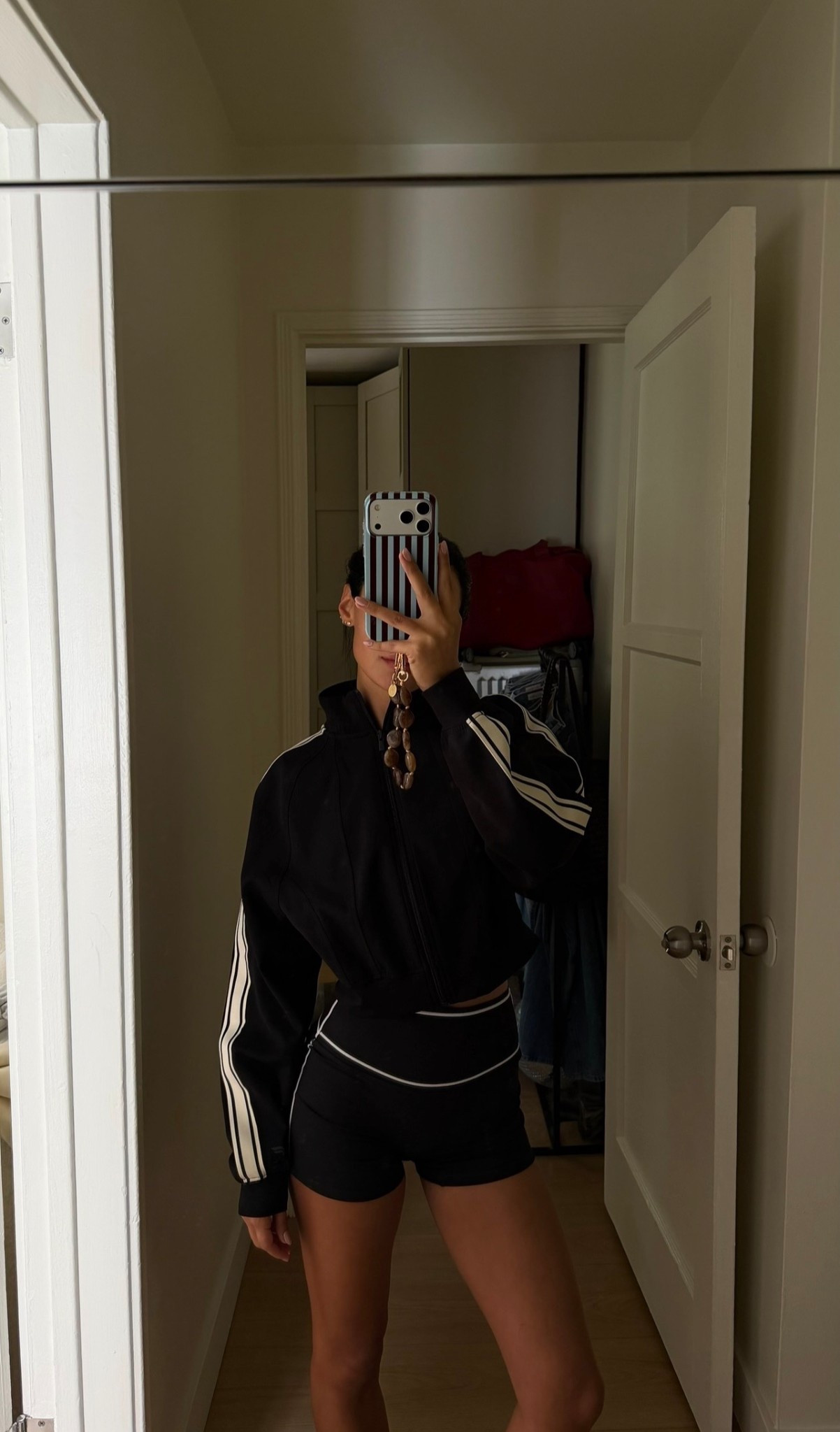 Fabletics black and white striped bomber jacket + sports bra & biker shorts #activewear 

#LTKdayinmylife #LTKfitnessgoals #LTKFestival