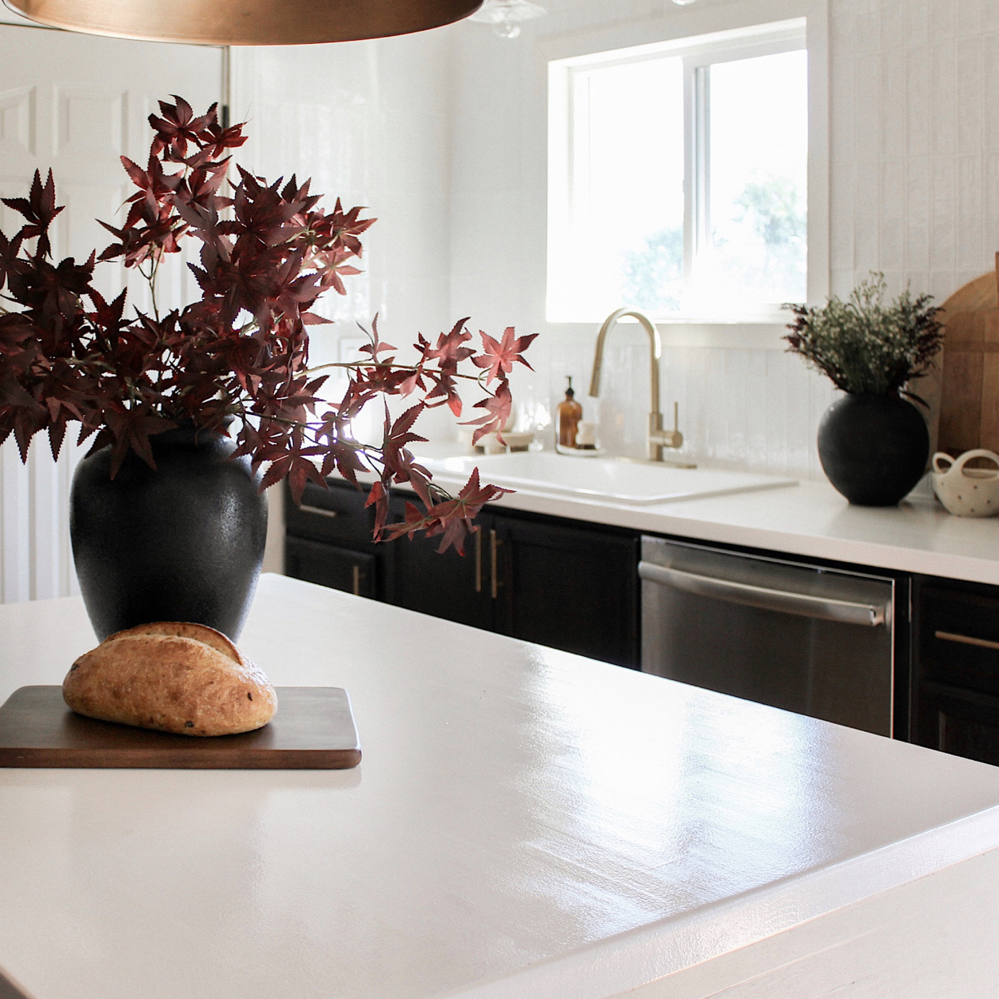 Fall kitchen 

Black vase. Fall florals. Charcuterie board. Bread board. Kitchen decor. Fall home decor. Home decor. Brass pendant. Island pendant. Island stools  

#LTKhome #LTKSeasonal #LTKfindsunder50