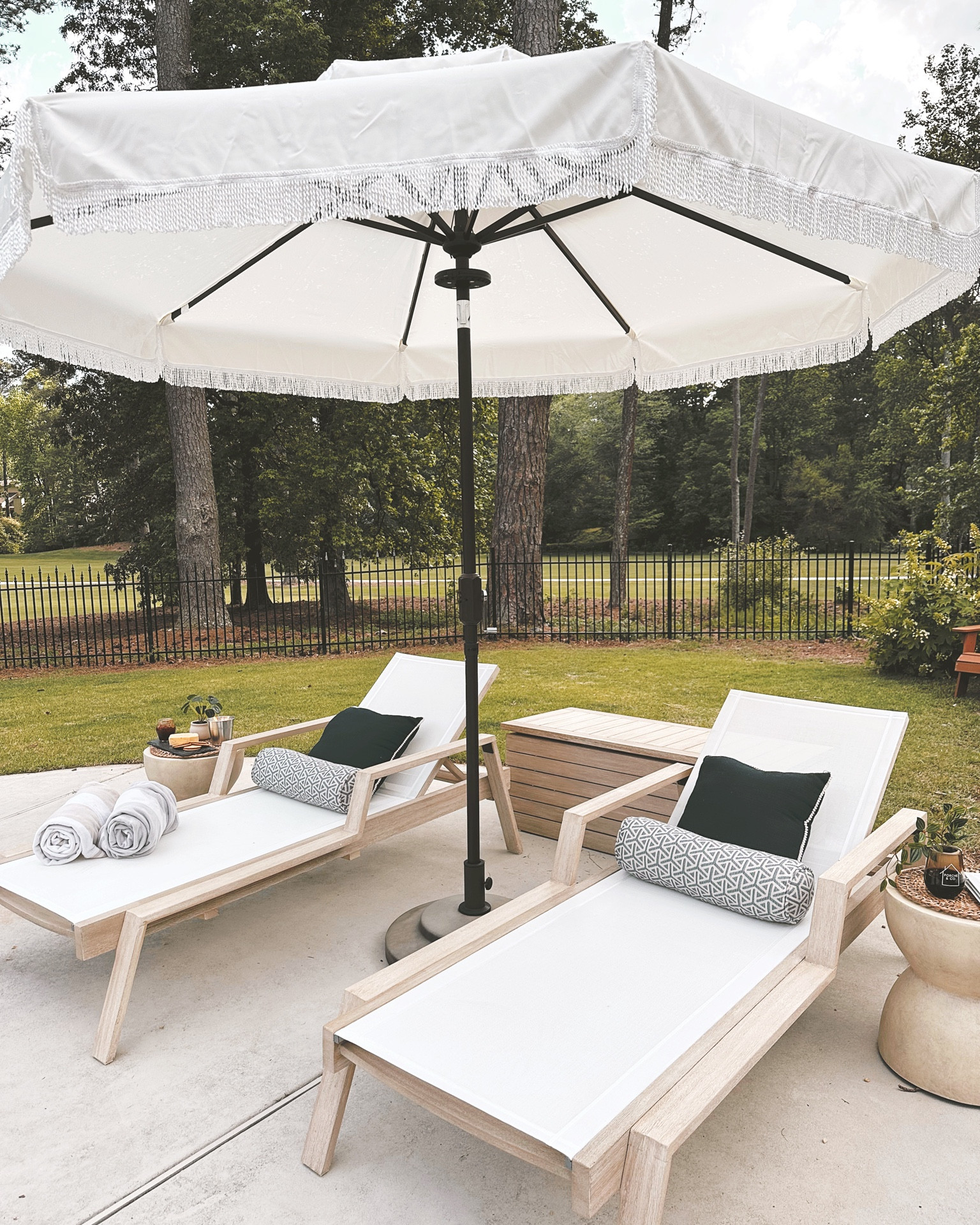 Outdoor furniture and decor // pool lounge chaise chairs with pillows, side tables, front umbrella and storage bench from Pottery Barn and Target #potterybarn #target

#LTKSeasonal #LTKhome #LTKstyletip