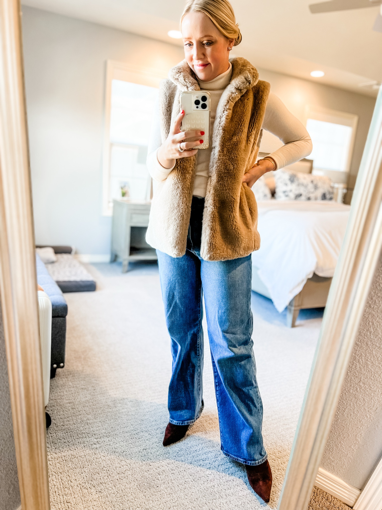 What shoes to wear with wear with wide leg jeans. A short boot with a pointed toe pairs great with a wide leg jean. As a petite, the pointed toe breaks up the wideness of the jean legs and adds length. Linking wide leg jeans and faux fur vests. 
Petite outfit, jeans, winter outfit, pointed toe boots, short boots 

#LTKShoeCrush #LTKSaleAlert