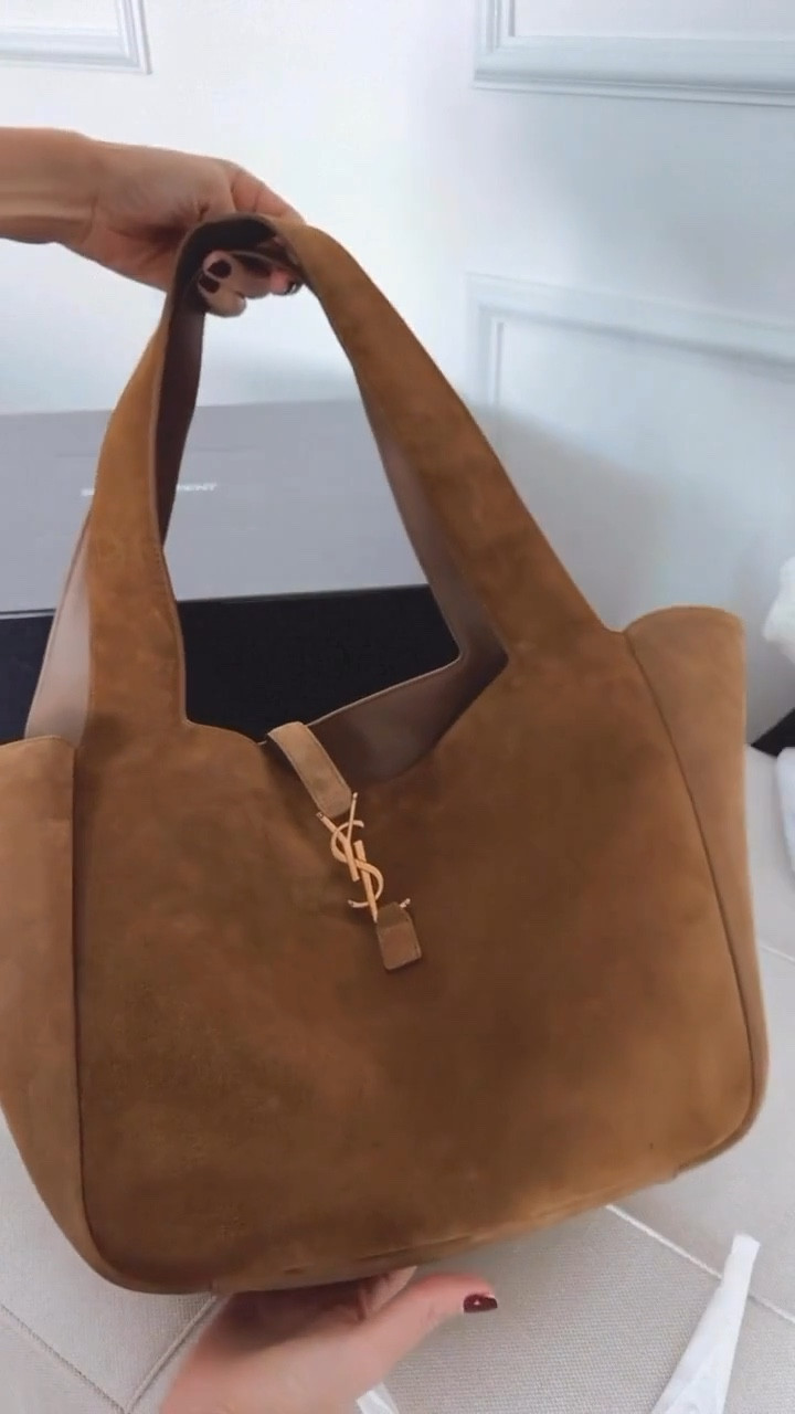 Designer suede tote that I love so much! Perfect for so many occasions 

#LTKOver40 #LTKSeasonal