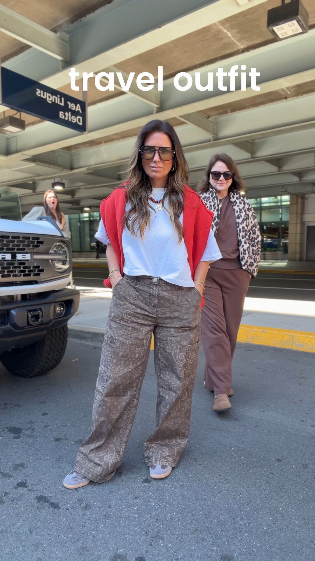Travel outfit ~ love these Walmart pants so much!!! Wearing size medium. And, this is my favorite crop T-shirt. Wearing size large petite. 
Large in red sweater too.