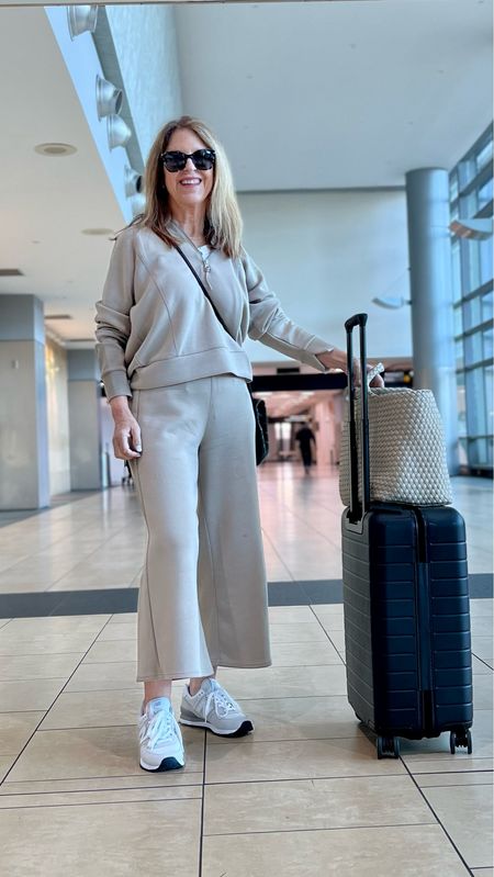 Travel in comfort! 
Wearing the most comfortable Spanx half-zip, crop flares, and new balance sneakers. 

#LTKFind #LTKtravel #LTKunder100