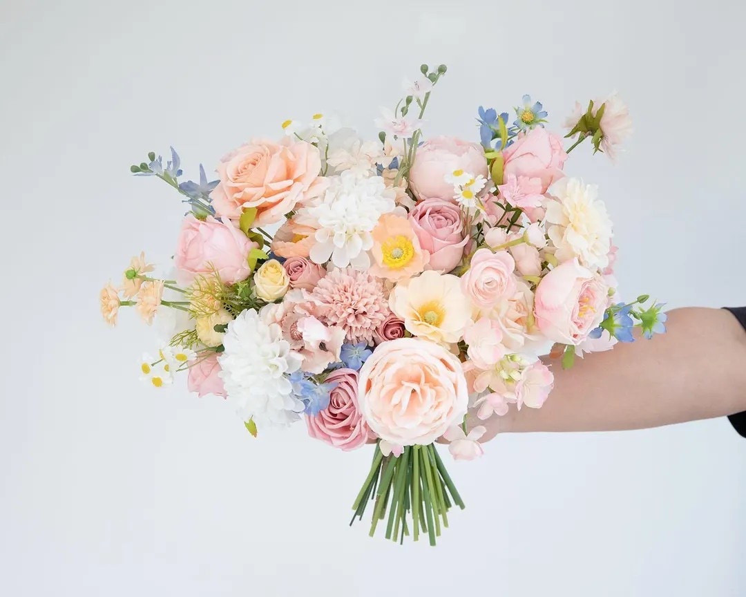 Soft, romantic, and effortlessly elegant, this garden-inspired bridal bouquet features dreamy shades of blush, peach, creamy white, and delicate blue. Designed with airy textures and natural movement, the silk florals create a timeless arrangement that looks stunning in photos and stays beautiful long after the wedding day. Perfect for garden ceremonies, barn weddings, or classic church celebrations. 💐 #LTKwedding #bridalbouquet #gardenwedding #silkflowers #weddinginspo #romanticwedding #bohowedding #bridalstyle

#LTKSeasonal #LTKWedding #LTKHome