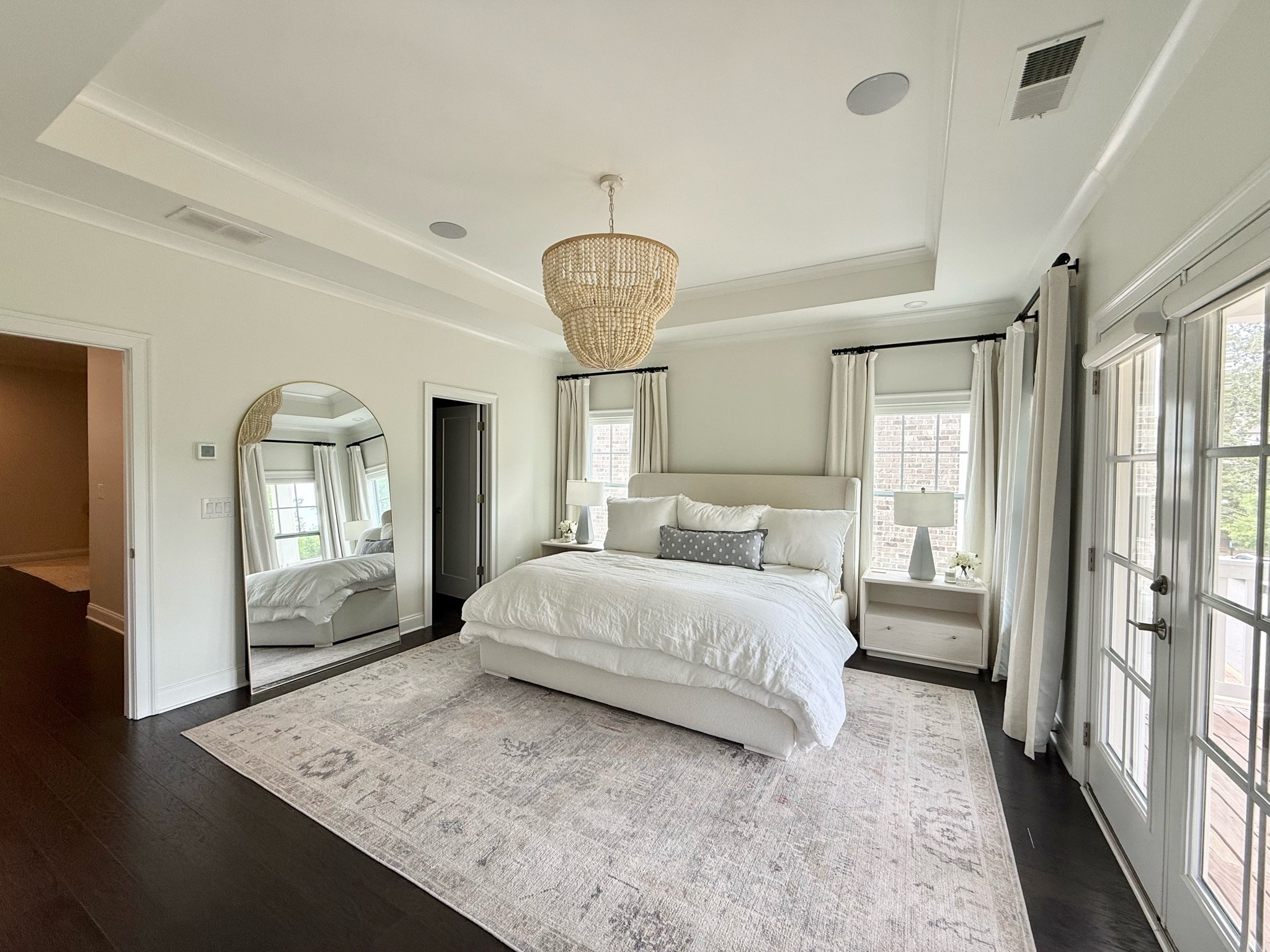 Bedroom. Furniture. Home decor. Nightstand. Whitewashed. Rug. 9 x 12. Vintage rug. Medallion rug. Pale blue rug. Oversized mirror. Gold mirror. Floor mirror. Leaning mirror. Full length mirror. Arched mirror.

#LTKOver40 #LTKHome