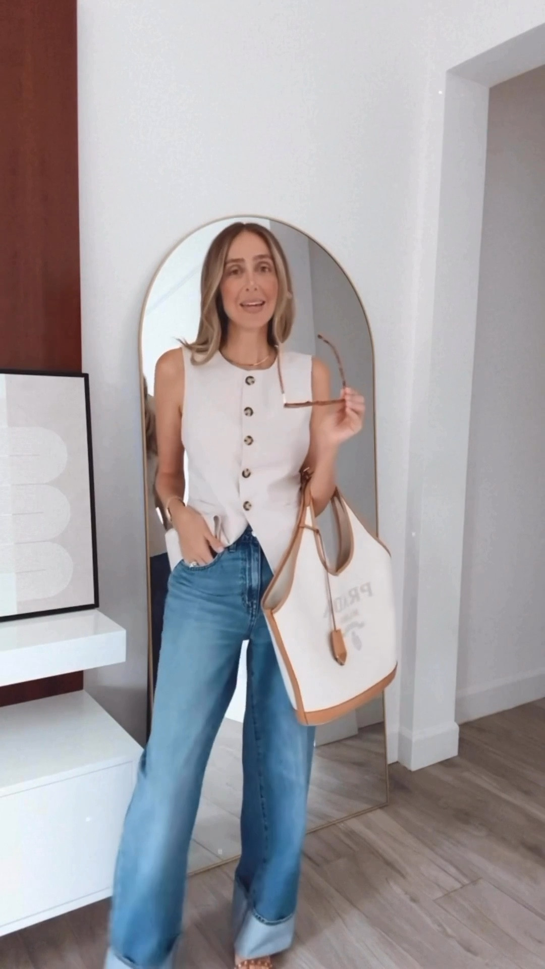 Casual chic outfit that I wore today. Love this button down vest! Perfect for early fall, these jeans fit perfectly, and the Prada bag is such a staple 
Top: small 
Pants: Tall 27 




#LTKStyleTip #LTKU #LTKSeasonal