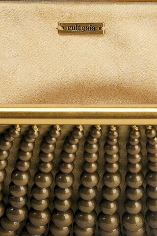 Cult Gaia Nia Mini Clutch in Antique Brass from Revolve.com | Revolve Clothing (Global)