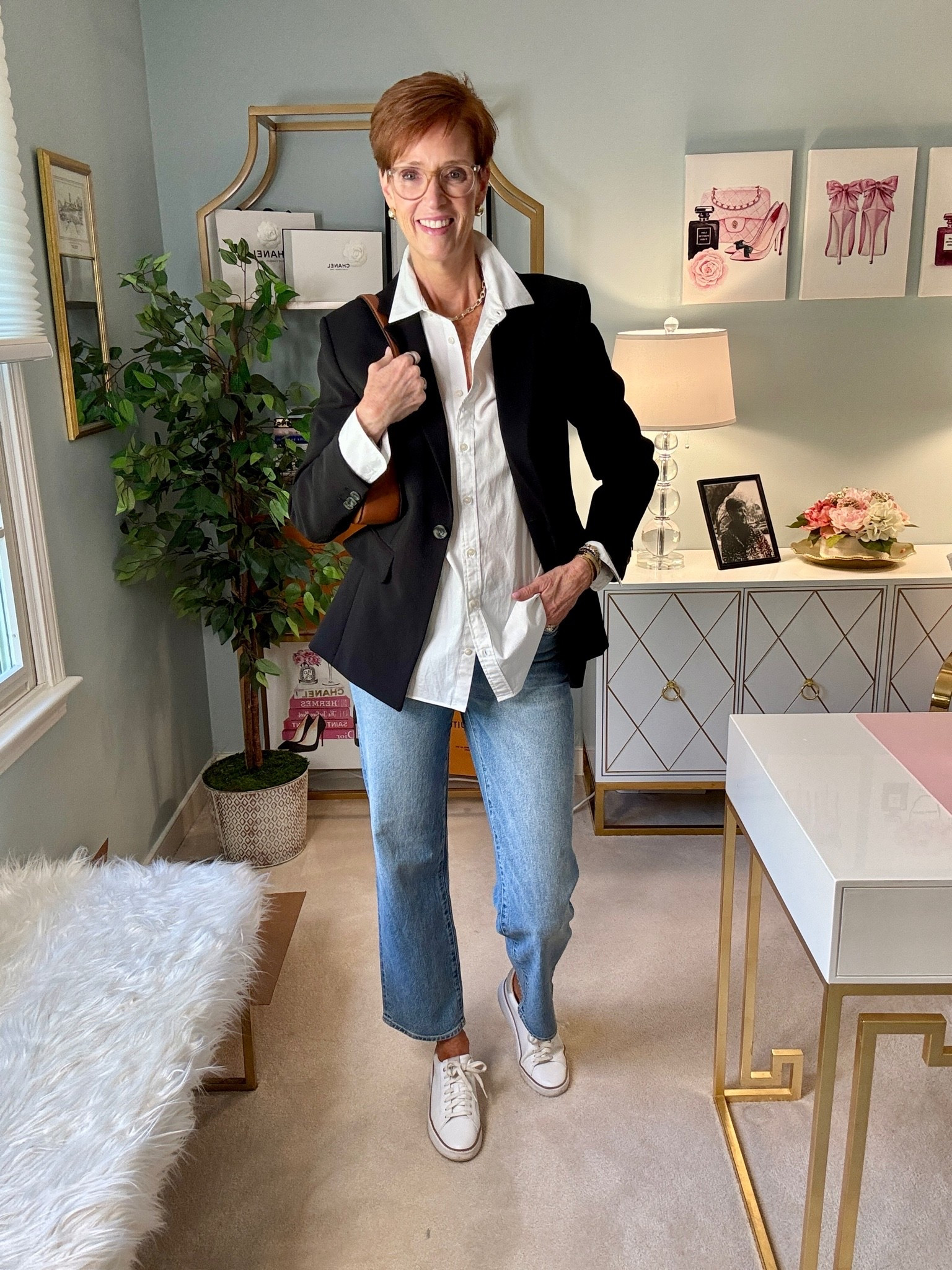 A white button-down and light-wash straight-leg jeans are already a classic combination. Add a black blazer and white leather sneakers, and suddenly the same basics feel much more polished without becoming dressy.

This is exactly why I keep reaching for a black blazer in the fall. And if this one looks familiar, it should. You saw it yesterday styled completely differently. The pieces that earn space in my closet are the ones I can actually wear more than one way.

Save this easy fall outfit formula for your next jeans day, and share it with a friend who loves classic everyday style.

Would you finish this outfit with sneakers, loafers or heels?

#FallOutfitIdeas #BlazerOutfits #StyleOver40 #ClassicStyle

#LTKootd #LTKOver40 #LTKTall