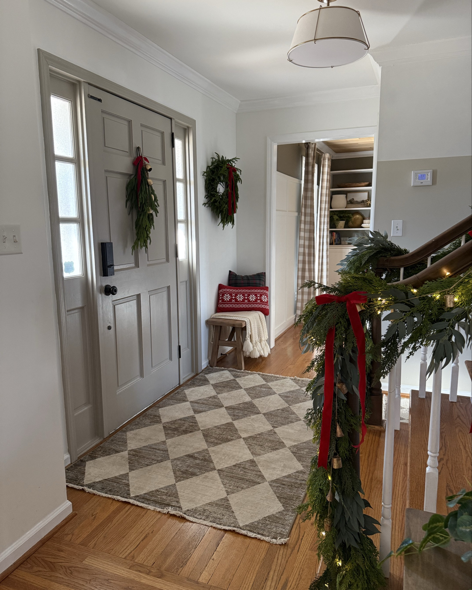My 2025 Christmas entry and stairway 

#LTKHoliday #LTKHome #LTKSeasonal