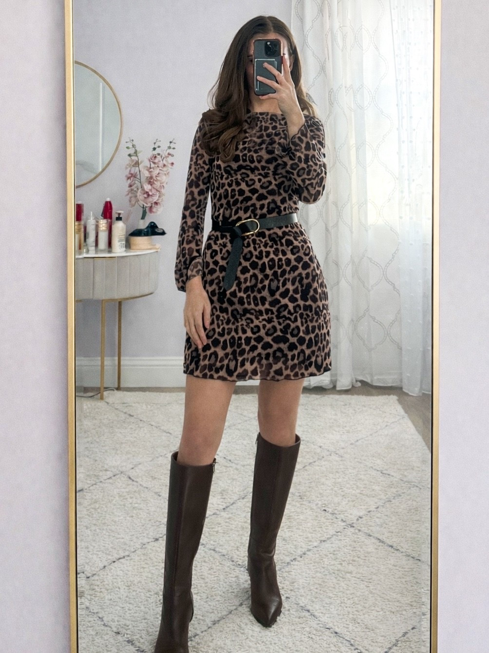 Leopard print mini dress styled with knee high boots is my go to date night outfit when I want something chic but effortless. This dress and boots outfit works for dinner plans, girls night, or a night out. If you’re searching for leopard print outfit ideas, mini dress with boots, or an elevated night out outfit, this look is super flattering and easy to style.
.
.
.
.
.
.
#LTKNYFW #LTKValentine #LTKootd #LTKgrwm #LTKdayinmylife #LTKSeasonal #LTKU #LTKSaleAlert #LTKWorkwear

Date night outfits | date night dress | dinner outfit | dinner dress | dress Amazon | dress and boots | elegant dress | long sleeve dress | mini dress | boots outfit | brown boots | work dress | work outfits | 