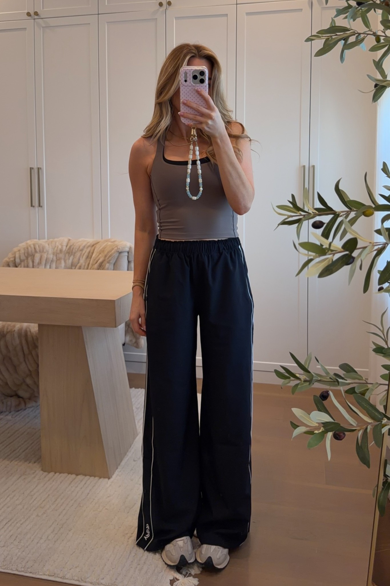 bra tank: xs // track pants: xs regular — you will not regret these pants! they’re amazing. this bra tank is super supportive— if you’re in between sizes or have a larger chest, consider sizing up.