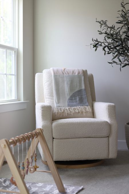 Boucle recliner glider chair for nursery or playroom 