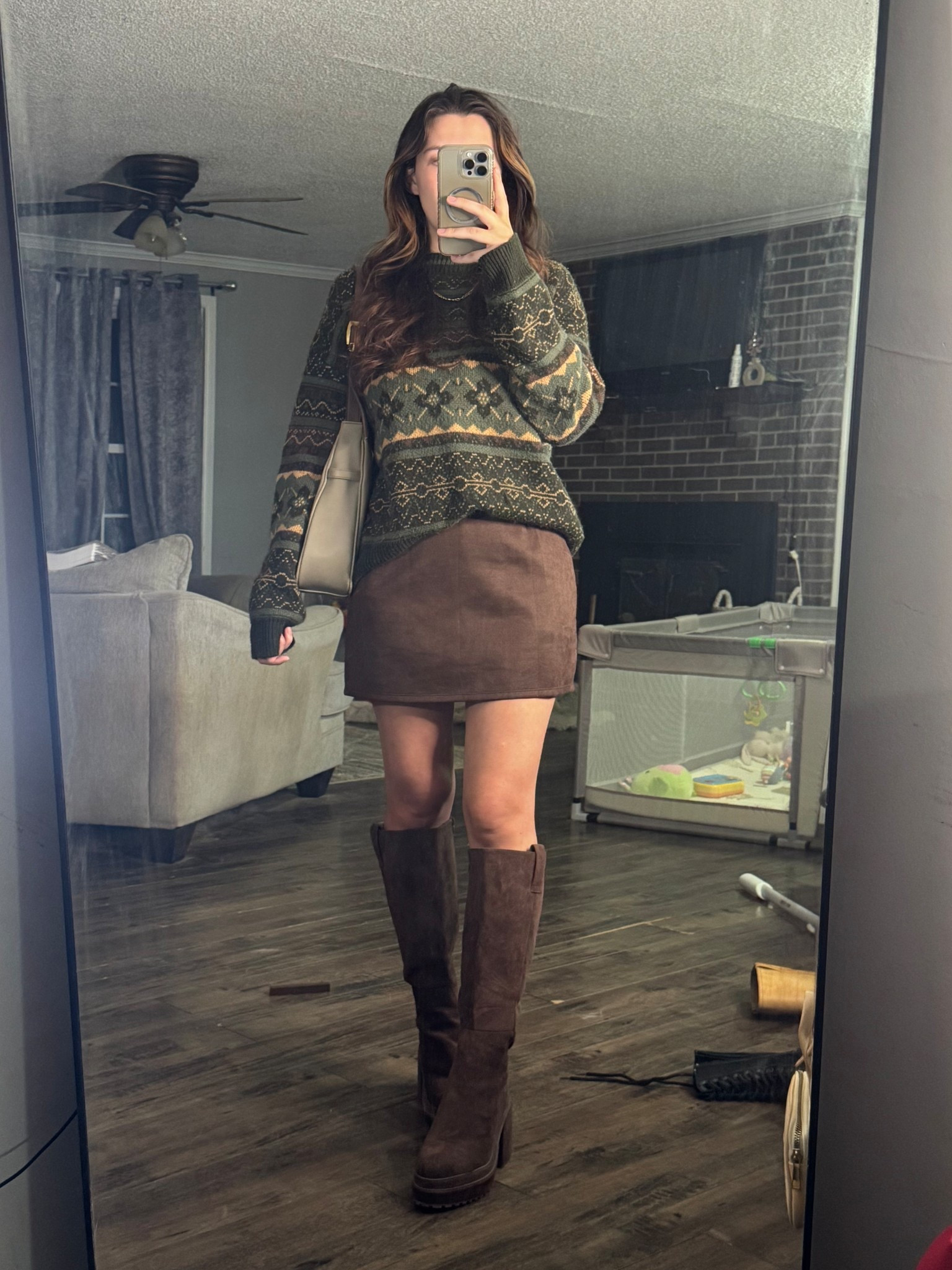 Fall outfit with an oversized sweater, brown mini skirt, and knee high boots! 

#LTKSeasonal #LTKFindsUnder50 #LTKStyleTip
