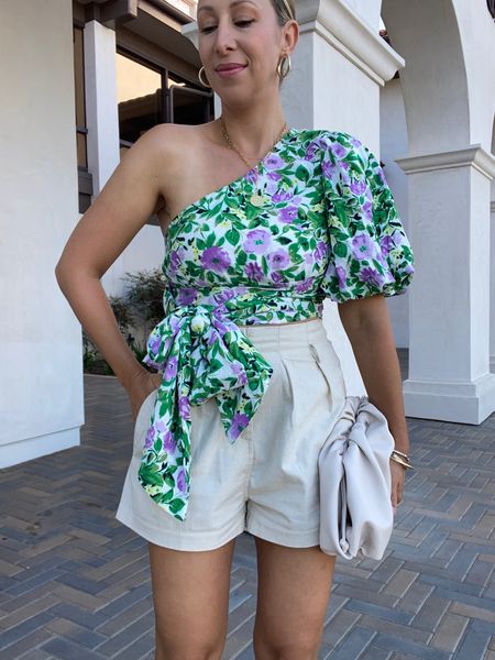 Favorite vacation outfit shirt one shoulder flower top clutch vacay outfit 